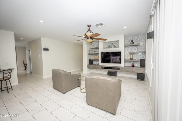 35317 N 31st Dr, Phoenix, AZ 85086 - living room featuring a fireplace, visible vents, recessed lighting, and a ceiling fan