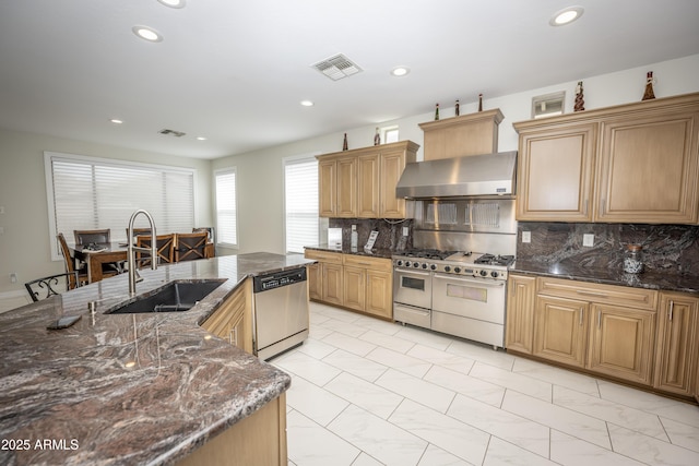 35317 N 31st Dr, Phoenix, AZ 85086 - kitchen featuring a sink, visible vents, wall chimney range hood, and stainless steel appliances