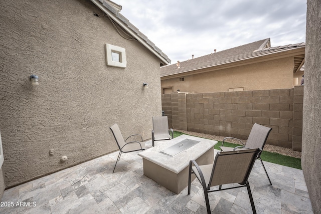 35317 N 31st Dr, Phoenix, AZ 85086 - view of patio / terrace with a fire pit and fence