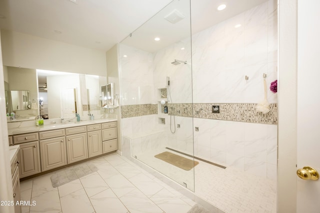 35317 N 31st Dr, Phoenix, AZ 85086 - bathroom with tile walls, marble finish floor, a marble finish shower, recessed lighting, and vanity