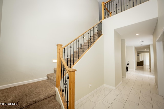 35317 N 31st Dr, Phoenix, AZ 85086 - staircase featuring a high ceiling, marble finish floor, baseboards, and recessed lighting
