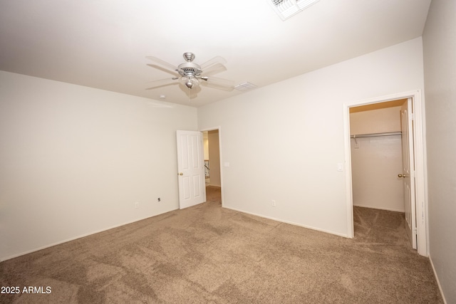 35317 N 31st Dr, Phoenix, AZ 85086 - unfurnished bedroom with carpet flooring, a walk in closet, a closet, and visible vents