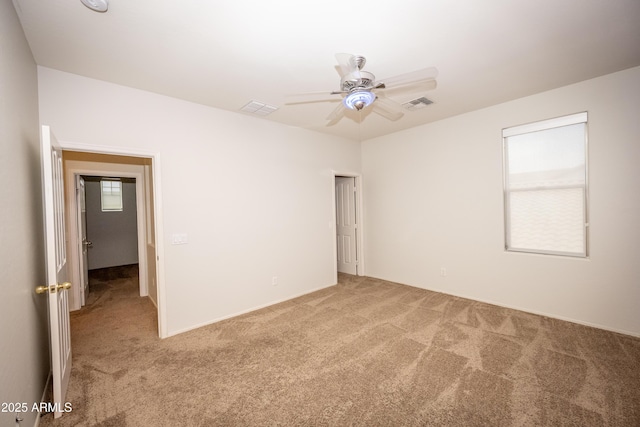 35317 N 31st Dr, Phoenix, AZ 85086 - spare room featuring a ceiling fan, carpet, and visible vents