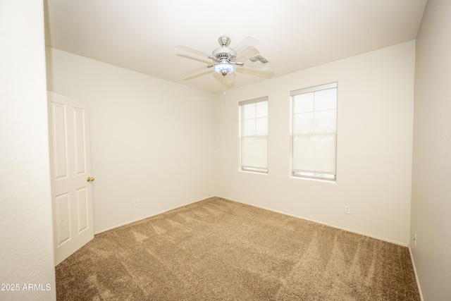 35317 N 31st Dr, Phoenix, AZ 85086 - empty room featuring carpet flooring, a ceiling fan, and visible vents