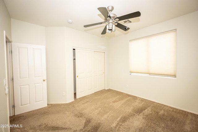 35317 N 31st Dr, Phoenix, AZ 85086 - unfurnished bedroom featuring a ceiling fan, carpet, a closet, and visible vents