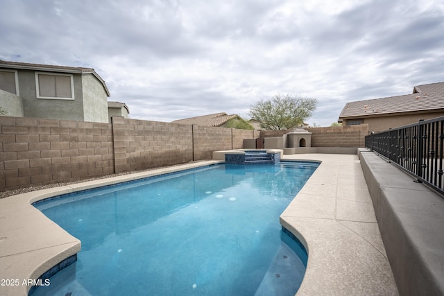 35317 N 31st Dr, Phoenix, AZ 85086 - view of pool featuring a fenced backyard and a pool with connected hot tub