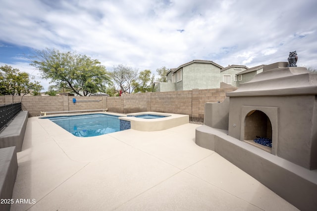 35317 N 31st Dr, Phoenix, AZ 85086 - view of swimming pool featuring a patio, a fenced backyard, and a pool with connected hot tub