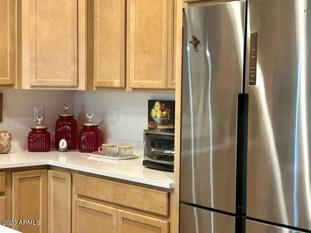 2525 N Riverside Dr, Florence, AZ 85132 - kitchen featuring freestanding refrigerator and light countertops