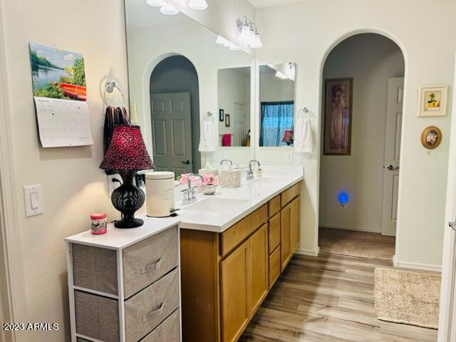 2525 N Riverside Dr, Florence, AZ 85132 - bathroom with wood finished floors and double vanity