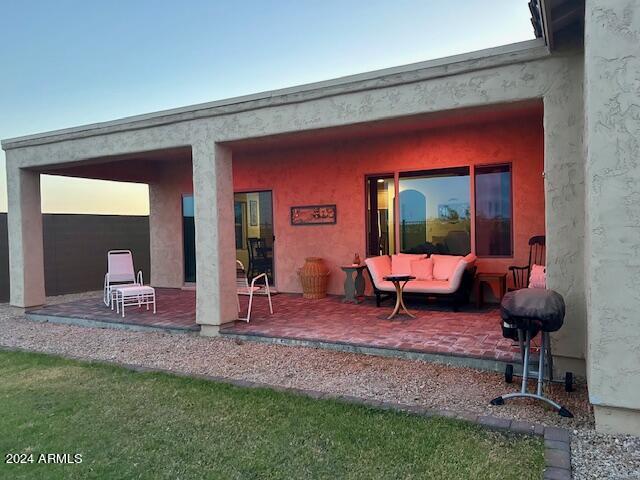 2525 N Riverside Dr, Florence, AZ 85132 - rear view of house featuring a patio and stucco siding