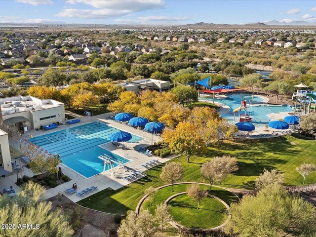 2525 N Riverside Dr, Florence, AZ 85132 - drone / aerial view of a pool and a mountain backdrop