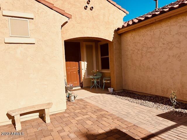 2525 N Riverside Dr, Florence, AZ 85132 - entrance to property featuring stucco siding and a patio