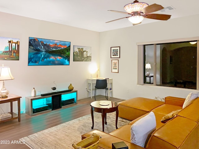 2525 N Riverside Dr, Florence, AZ 85132 - living area with wood finished floors and ceiling fan
