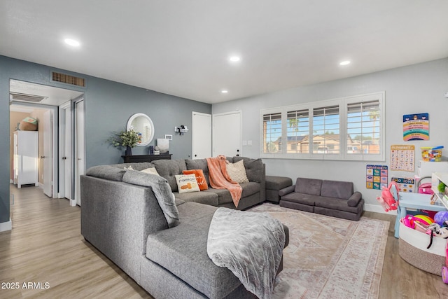 living room with light wood-type flooring