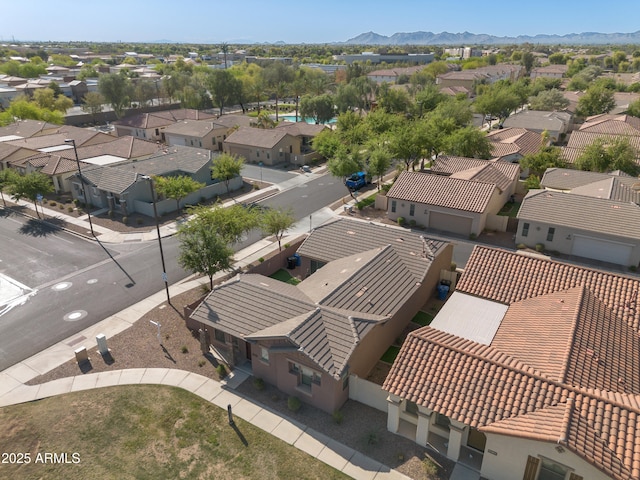 birds eye view of property featuring a residential view and a mountain view