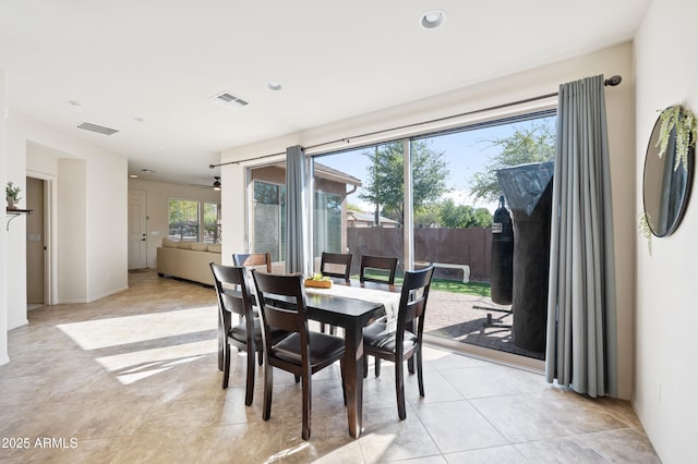 dining area featuring visible vents, recessed lighting, and light tile patterned flooring