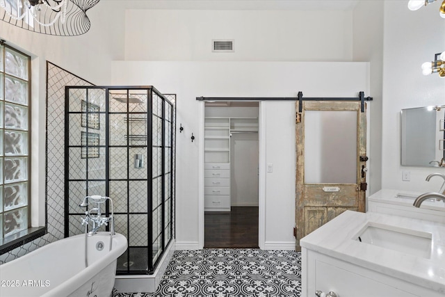 26264 N 46th St, Phoenix, AZ 85050 - bathroom featuring a stall shower, tile patterned floors, a freestanding tub, and vanity
