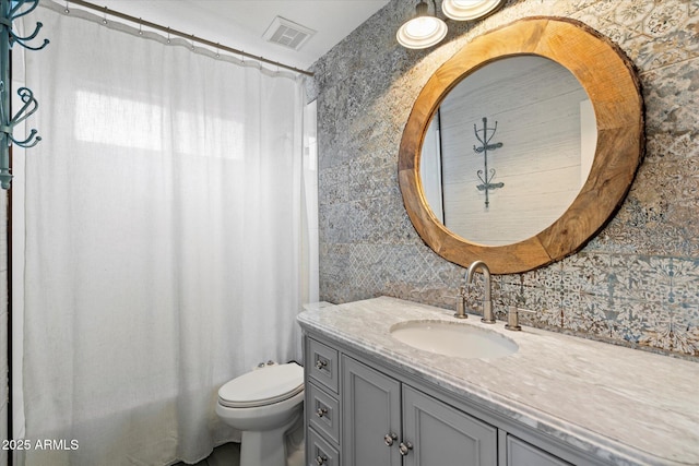 26264 N 46th St, Phoenix, AZ 85050 - full bathroom with toilet, vanity, tasteful backsplash, a shower with shower curtain, and tile walls