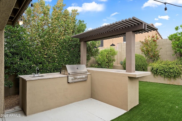 26264 N 46th St, Phoenix, AZ 85050 - view of patio / terrace featuring grilling area, an outdoor kitchen, a sink, a pergola, and fence