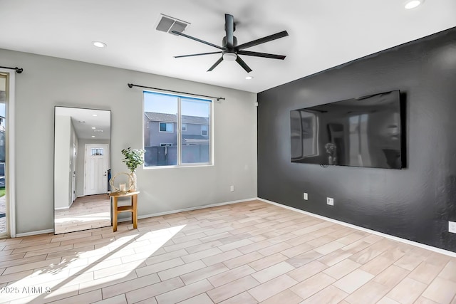 spare room with visible vents, baseboards, ceiling fan, wood finished floors, and recessed lighting