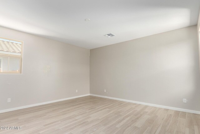 empty room featuring light hardwood / wood-style flooring