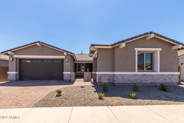 single story home with a garage