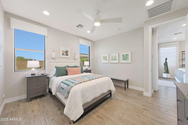 18746 W Rancho Dr, Litchfield Park, AZ 85340 - bedroom featuring visible vents and light wood finished floors