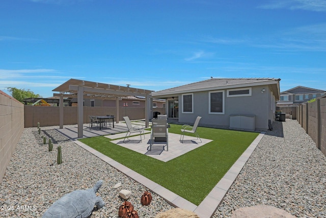 18746 W Rancho Dr, Litchfield Park, AZ 85340 - rear view of property featuring a pergola, a patio area, a yard, a fenced backyard, and stucco siding