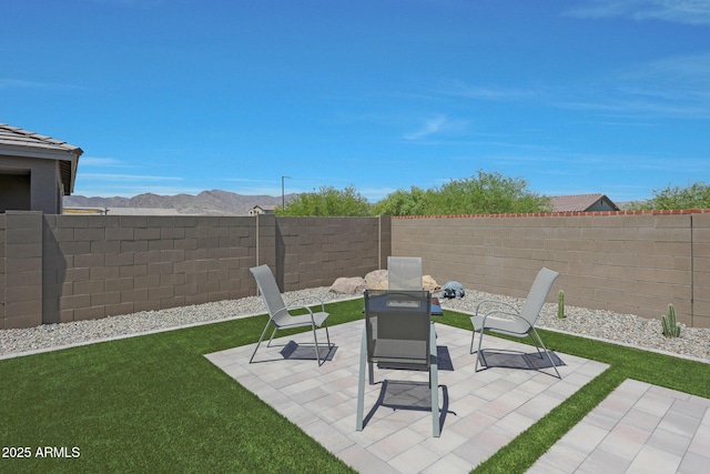 18746 W Rancho Dr, Litchfield Park, AZ 85340 - view of patio featuring a fenced backyard and an outdoor fire pit
