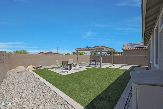 18746 W Rancho Dr, Litchfield Park, AZ 85340 - view of yard featuring a fenced backyard, a patio area, and a pergola