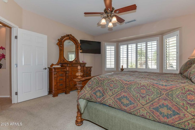 bedroom with vaulted ceiling and ceiling fan