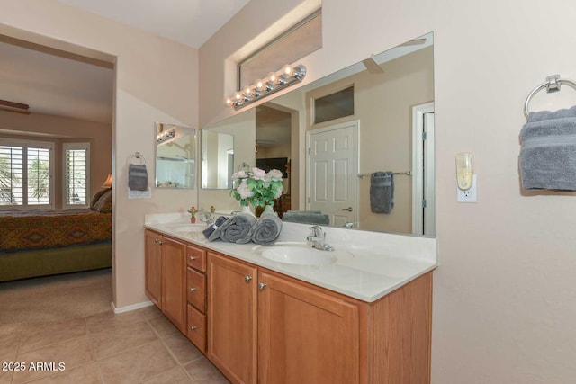 bathroom with vanity and tile patterned flooring