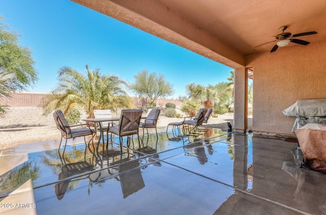 view of patio with ceiling fan