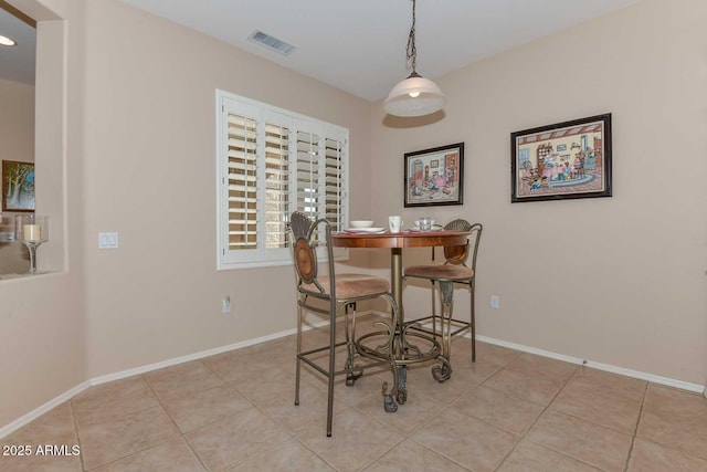 view of tiled dining area