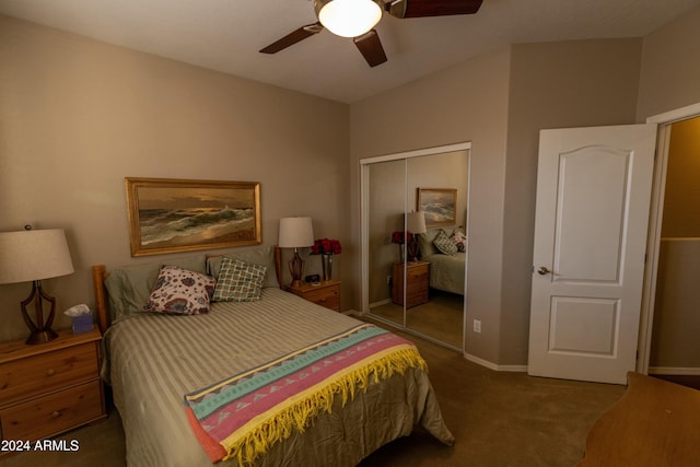 carpeted bedroom with ceiling fan and a closet