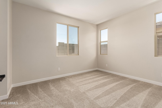 5641 N 205th Ln, Buckeye, AZ 85396 - empty room with carpet flooring and baseboards