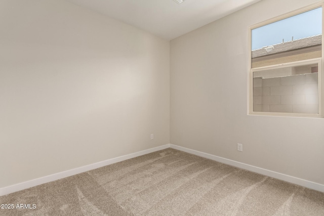 5641 N 205th Ln, Buckeye, AZ 85396 - carpeted empty room with baseboards