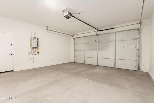 5641 N 205th Ln, Buckeye, AZ 85396 - garage with a garage door opener, water heater, and baseboards