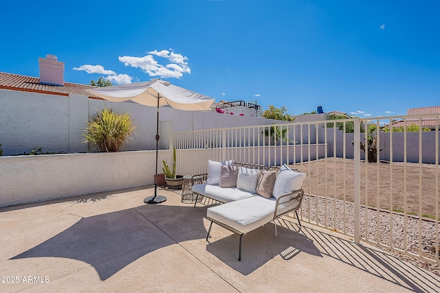view of patio featuring a fenced backyard
