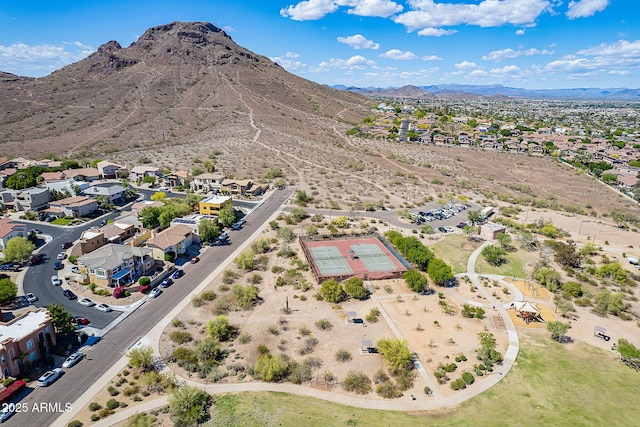 birds eye view of property with a residential view and a mountain view