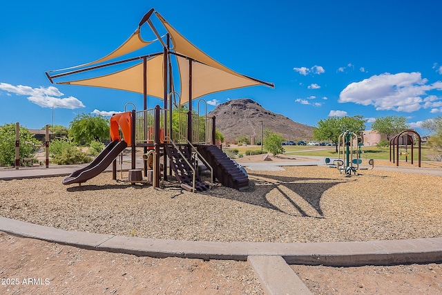 community playground featuring a mountain view