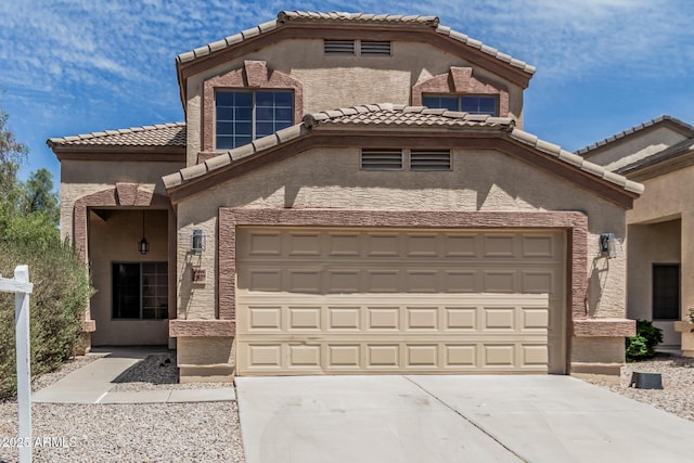 23637 N Desert Dr, Florence, AZ 85132 - mediterranean / spanish home featuring an attached garage, driveway, and a tiled roof