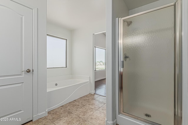 23637 N Desert Dr, Florence, AZ 85132 - full bathroom with a stall shower, tile patterned flooring, a garden tub, and baseboards