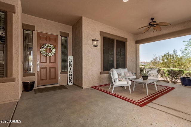 3331 N Acacia Way, Buckeye, AZ 85396 - property entrance featuring ceiling fan, stucco siding, and covered porch