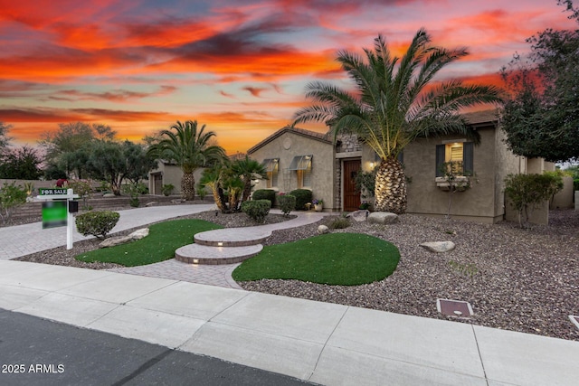 28247 N 128th Dr, Peoria, AZ 85383 - mediterranean / spanish-style house featuring driveway and stucco siding