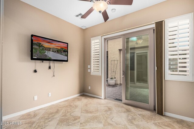 28247 N 128th Dr, Peoria, AZ 85383 - interior space with a ceiling fan, visible vents, and baseboards