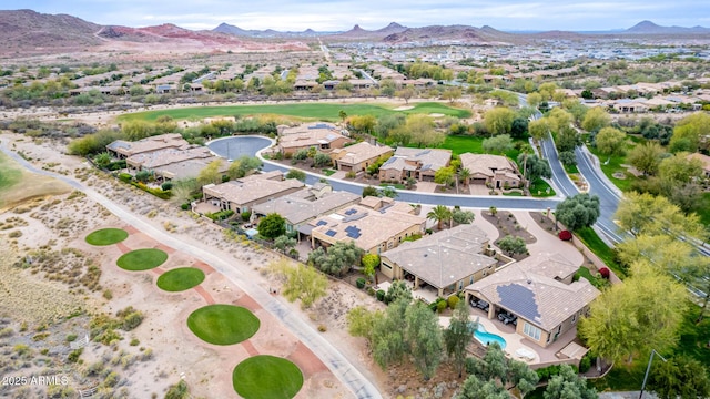 drone / aerial view featuring a residential view and a mountain view