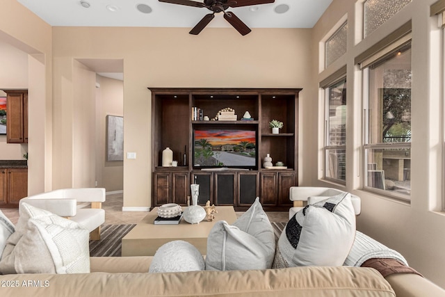 28247 N 128th Dr, Peoria, AZ 85383 - living room featuring ceiling fan and baseboards