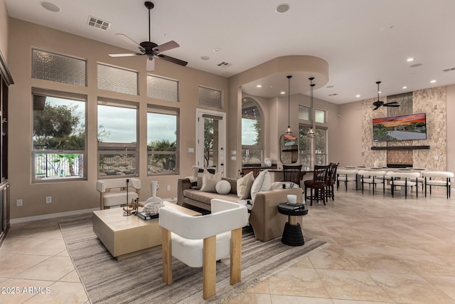 28247 N 128th Dr, Peoria, AZ 85383 - living area with a ceiling fan, recessed lighting, visible vents, and baseboards