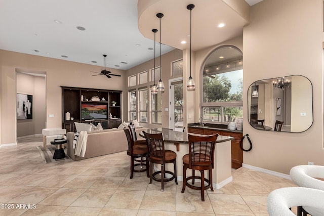28247 N 128th Dr, Peoria, AZ 85383 - dining room with light tile patterned floors, recessed lighting, a ceiling fan, and baseboards